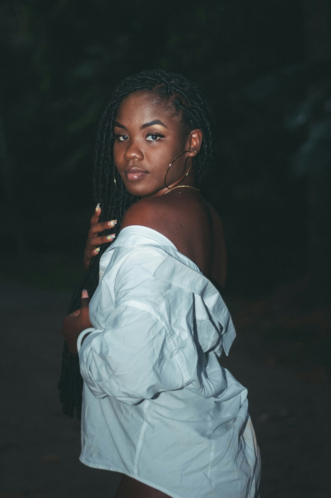 Portrait of a Black Canadian woman with short curly hair