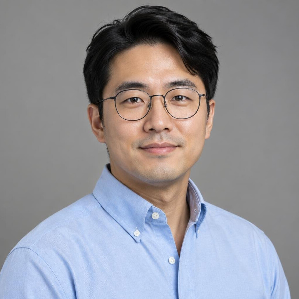 Portrait of a Korean Canadian man wearing glasses